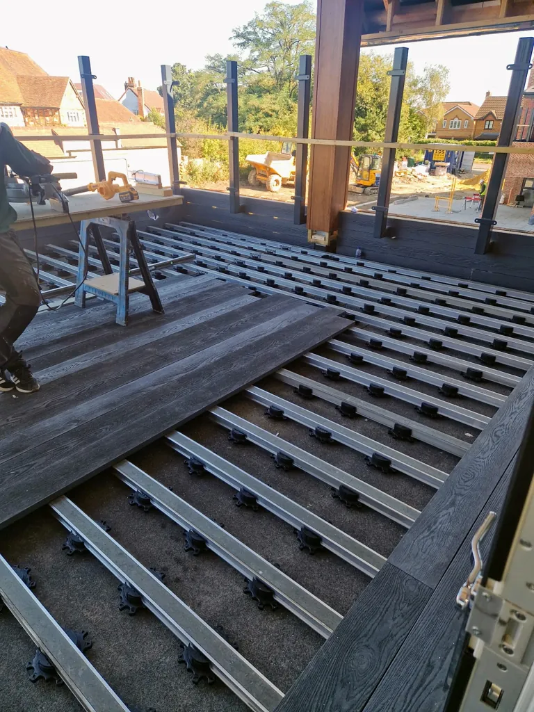 Decking substructure with metal joists and support system before final boards installation